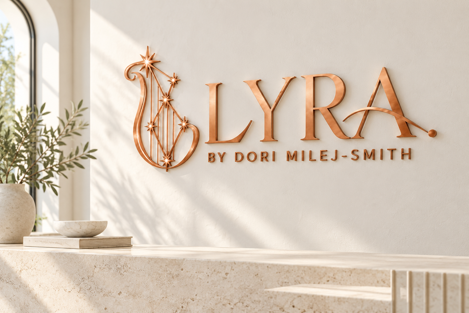 Copper LYRA lettering and harp symbol mounted on a light ivory reception wall.